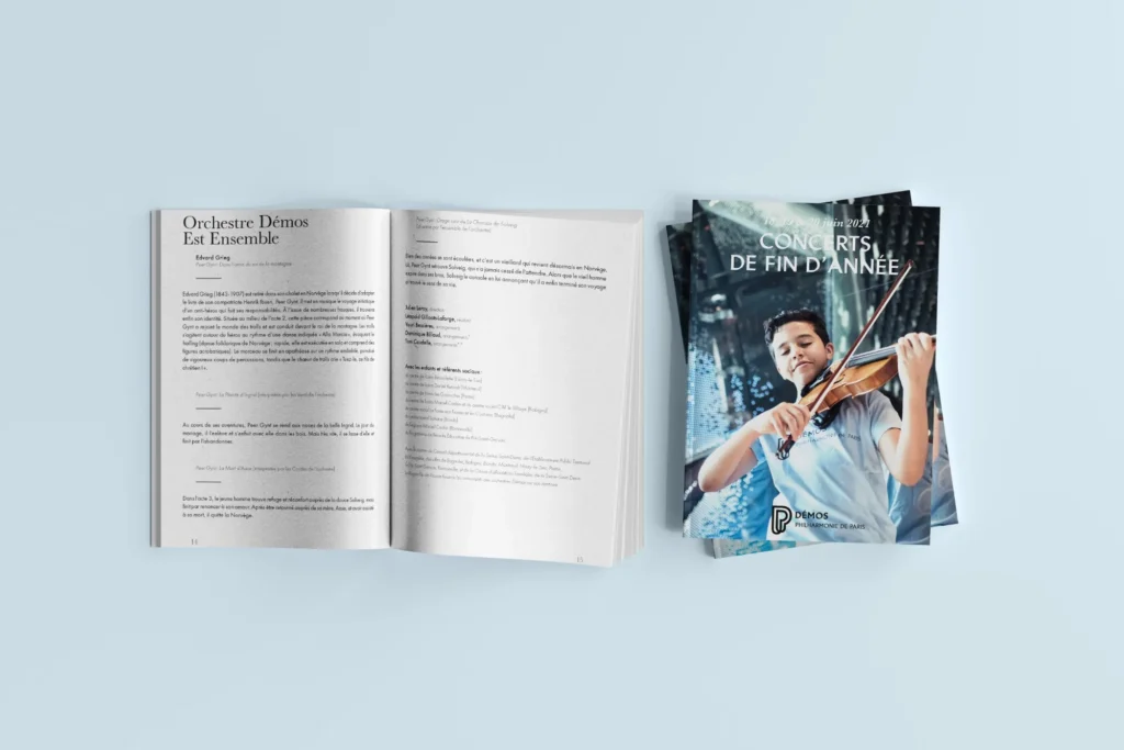 Mockup du programme des concerts de fin d'année de l'orchestre Démos, juin 2021 : couverture et double page